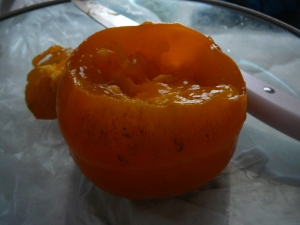 a persimmon, soft inside